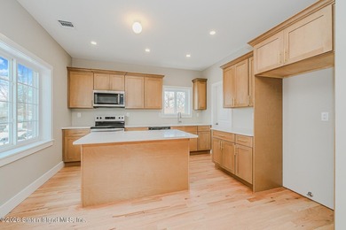 NEW CONSTRUCTION! Beautiful oversized TWO family 6/6 built with - photo 41