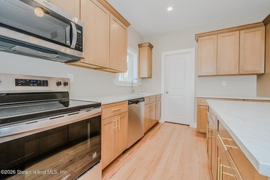NEW CONSTRUCTION! Beautiful oversized TWO family 6/6 built with - photo 42