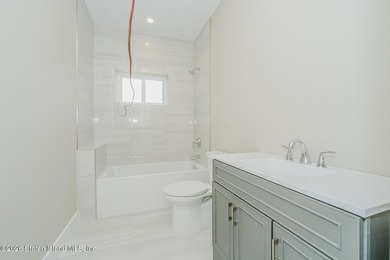 NEW CONSTRUCTION! Beautiful oversized TWO family 6/6 built with - photo 48