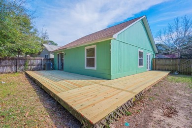MAJOR PRICE REDUCTION! Backyard OASIS with new deck just - photo 17