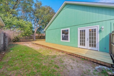 MAJOR PRICE REDUCTION! Backyard OASIS with new deck just - photo 19