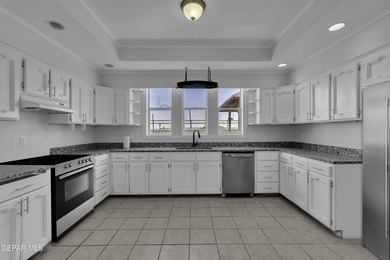 Welcome to this beautifully remodeled two-story home featuring 5