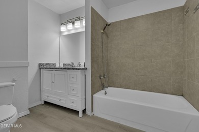 Welcome to this beautifully remodeled two-story home featuring 5