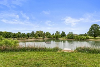 Set back on 5.38 waterfront acres in Mahomet, this custom-built - photo 5