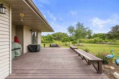 Set back on 5.38 waterfront acres in Mahomet, this custom-built - photo 6