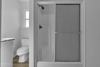 Welcome to this beautifully remodeled two-story home featuring 5