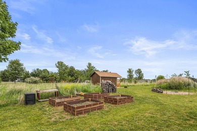 Set back on 5.38 waterfront acres in Mahomet, this custom-built - photo 10