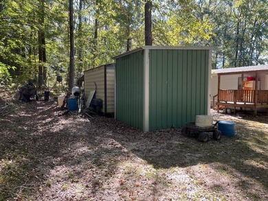 Discover peaceful lake living with this charming and - photo 13