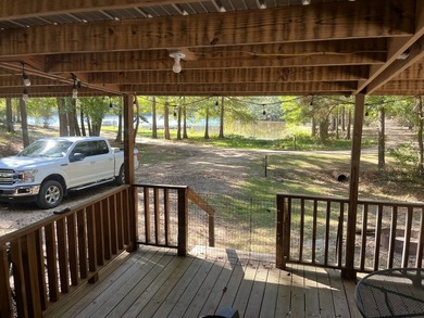 Discover peaceful lake living with this charming and - photo 14
