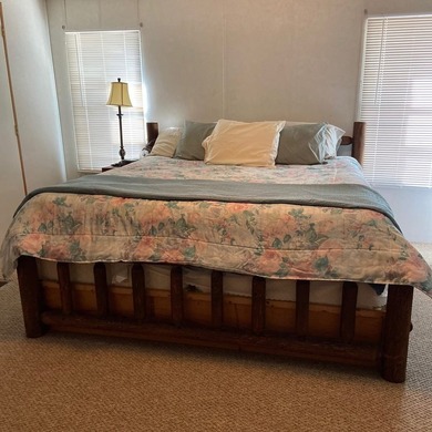Discover peaceful lake living with this charming and - photo 22