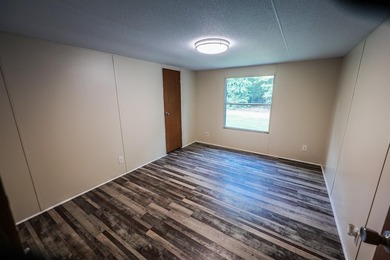 3 BEDROOM 2 BATH ON LARGE LOT WITHIN WALKING DISTANCE OF ISLAND - photo 2