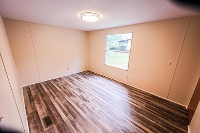 3 BEDROOM 2 BATH ON LARGE LOT WITHIN WALKING DISTANCE OF ISLAND - photo 3