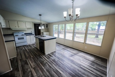 3 BEDROOM 2 BATH ON LARGE LOT WITHIN WALKING DISTANCE OF ISLAND - photo 5