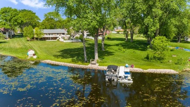 Waubeesee Lake Living at its Finest! Full 1 Acre Lot has 140ft - photo 1