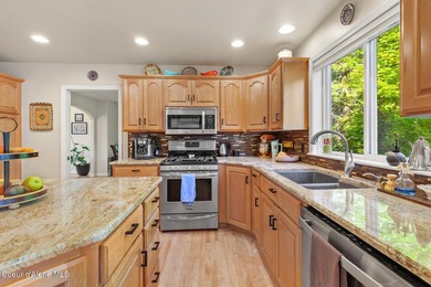 This spacious 6 BR/4 BA home is situated on nearly an acre in - photo 16