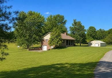 Don't miss this beautiful brick home with 3 bedrooms, 2 full - photo 2
