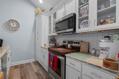 Convenience, low maintenance living, and an unbeatable in town - photo 8