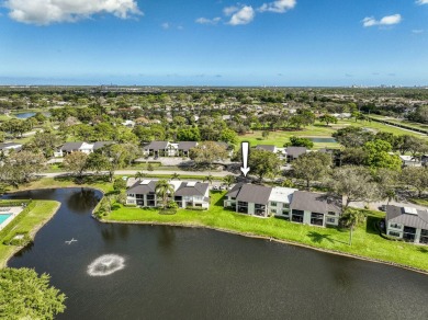 Lake Condo For Sale in Palm Beach Gardens, Florida