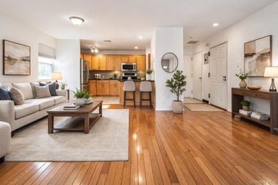 Welcome to this 3-bedroom, 1.5-bath condominium in a gated - photo 1