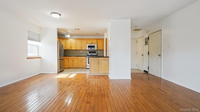Welcome to this 3-bedroom, 1.5-bath condominium in a gated - photo 2