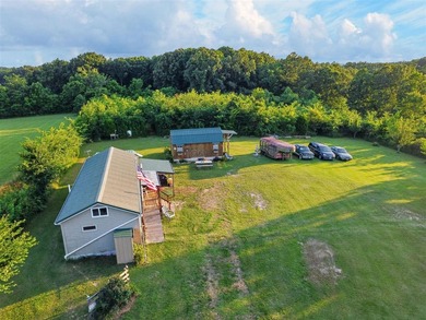 Tiny home on 3 plus acres. Park like setting. Very private - photo 8