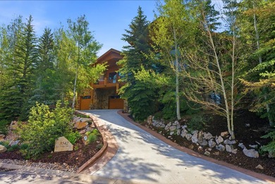Nestled among the trees of The Oaks at Deer Valley, this - photo 2