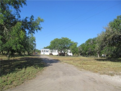 Lake Home For Sale in Sandia, Texas