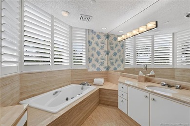 Enjoy oceanfront living in this sunny and bright three-bedroom - photo 30