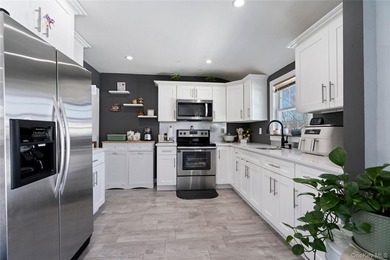 Welcome home to this beautifully maintained 4 bedroom, 2 full - photo 7