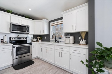 Welcome home to this beautifully maintained 4 bedroom, 2 full - photo 8