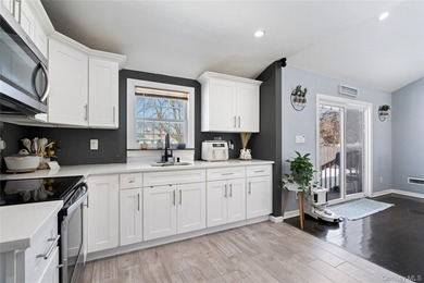 Welcome home to this beautifully maintained 4 bedroom, 2 full - photo 9