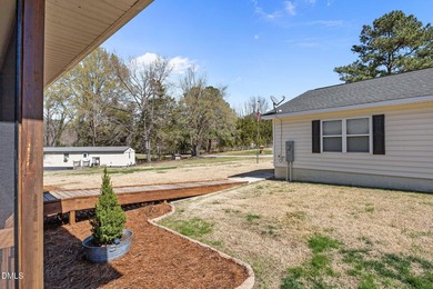 Custom-built home at Kerr Lake offering breathtaking water views - photo 15