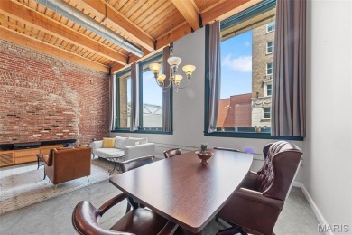 Live in the heart of downtown in an amazing building and save on