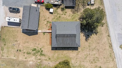 Custom-built home at Kerr Lake offering breathtaking water views - photo 16