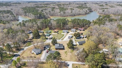 Custom-built home at Kerr Lake offering breathtaking water views - photo 17