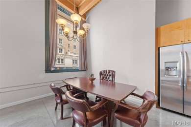 Live in the heart of downtown in an amazing building and save on
