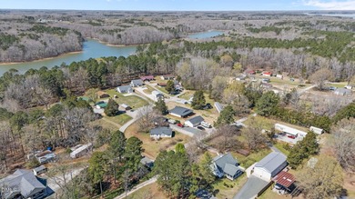 Custom-built home at Kerr Lake offering breathtaking water views - photo 18