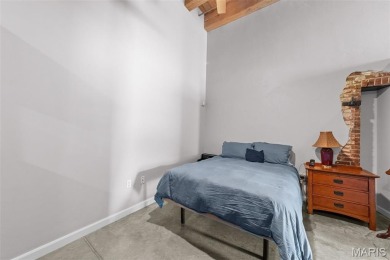 Live in the heart of downtown in an amazing building and save on