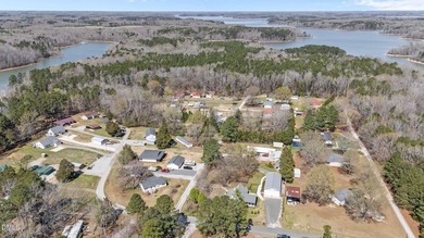 Custom-built home at Kerr Lake offering breathtaking water views - photo 19