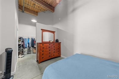 Live in the heart of downtown in an amazing building and save on