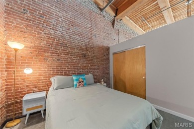 Live in the heart of downtown in an amazing building and save on