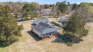 Custom-built home at Kerr Lake offering breathtaking water views - photo 21