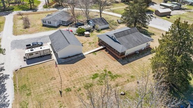 Custom-built home at Kerr Lake offering breathtaking water views - photo 22