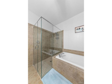 Live in the heart of downtown in an amazing building and save on