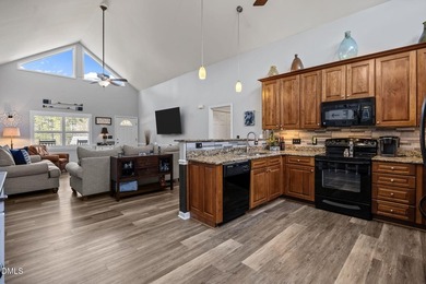 Custom-built home at Kerr Lake offering breathtaking water views - photo 31