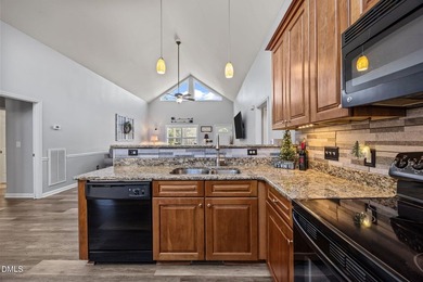 Custom-built home at Kerr Lake offering breathtaking water views - photo 32