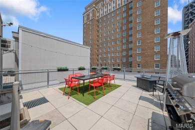 Live in the heart of downtown in an amazing building and save on