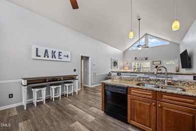 Custom-built home at Kerr Lake offering breathtaking water views - photo 33