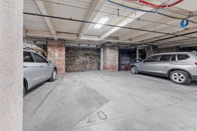 Live in the heart of downtown in an amazing building and save on