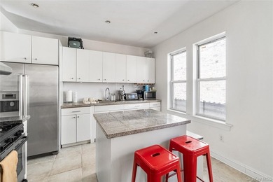 Beautiful and unique oversized brick 3 family home. Great - photo 6
